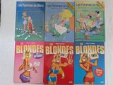 quatre livres posés sur une surface blanche, sur lesquels figure un personnage de dessin animé