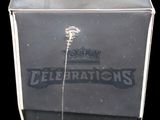 a clear box with a black and yellow logo on it