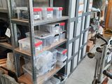 many boxes and boxes on the shelves in the garage