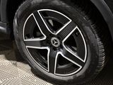 a close up of a car tire on the ground