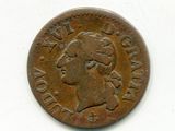 une vieille pièce de monnaie sur laquelle figure le visage d'une femme, sur un fond blanc