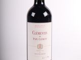 une image d'une bouteille de vin rouge sur fond blanc