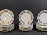 four plates stacked on top of each other on a table