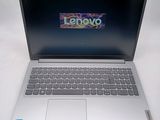 an open laptop computer sitting on top of a white table