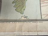 a newspaper with a map of france on it