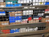 a cart with many boxes on it in a warehouse