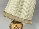 an image of a table lamp with a beige shade on it