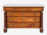 an antique chest of drawers with marble top