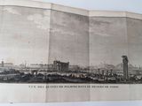 an old picture of a view of a city from a book