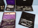 a lot of different tools in a case on a table