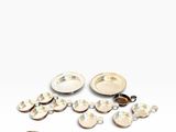 a lot of silver objects that are on the table