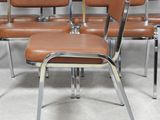 six chairs that are sitting in a row on the floor