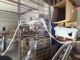 a picture of a room with a lot of boxes and hoses