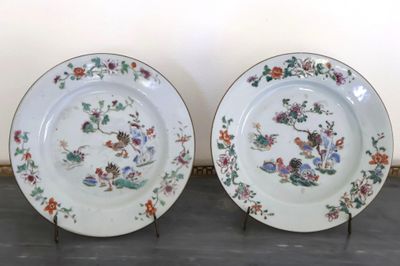 two plates that are sitting on a table