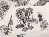 de nombreux dessins de motos rassemblés sur une table