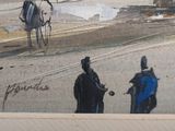 un tableau représentant un homme à cheval dans la rue