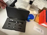 a person that is putting something in a box on the table