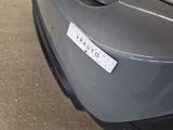 a close up of a car with a sticker on it ' s bumper