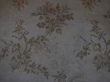 a picture of a bed with a floral pattern on it