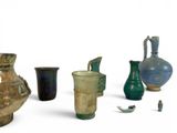 many different types of vases on a white surface