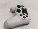 a close up of a video game controller on a table