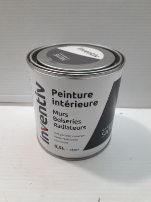 an image of a can of paint sitting on a table