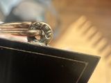 a ring that is sitting on top of a black box