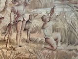 une peinture sur le mur d'un immeuble représentant un homme et une femme dans les bois