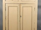 an image of a wooden cabinet with two doors and two drawers