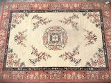 rug with a cross on the center of it on the floor
