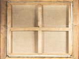 an old wooden window with a glass pane in the middle