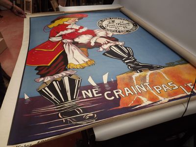 a picture of a poster on a table in a room
