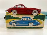 a toy car sitting on top of a box