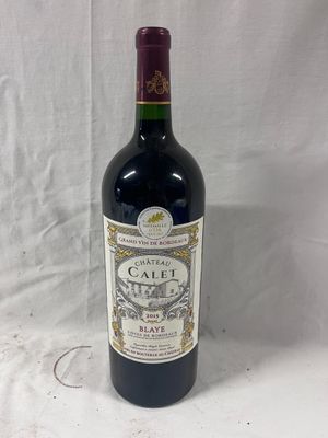 a bottle of wine that is sitting on a table