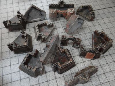 Un ensemble de 15 éléments de fortification de château en pl…