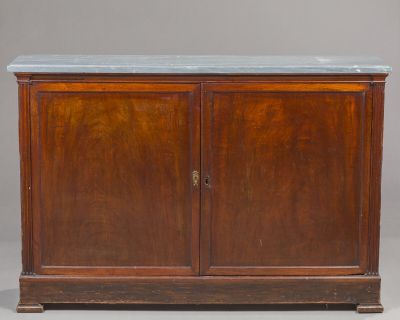 an old wooden cabinet with a marble top and two doors