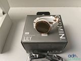 an image of a smart watch sitting on top of a box