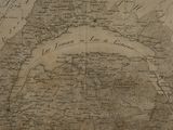 an old map of a town with a river in the middle of it