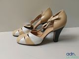 an image of a pair of women ' s shoes on a white surface