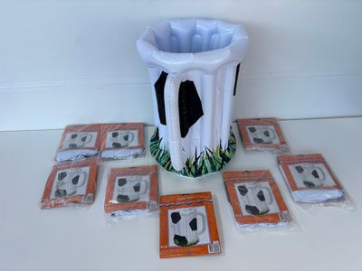 a picture of a vase with a soccer theme on it