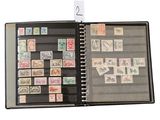 a black binder with a lot of stamps on it