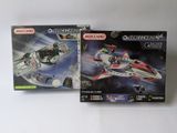 two boxed boxes of lego star wars action figures on a white surface