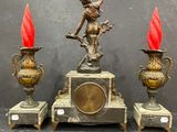 a statue of a woman holding a sword next to three vases