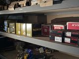 many boxes on the shelves in the room