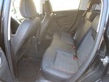 a car that has two seats in the back of it