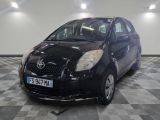 a picture of a black toyota yaris parked in a garage