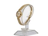 an image of a clock on a stand with a magnifying lens