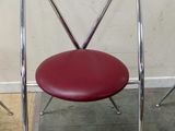 two chairs sitting next to each other in a room