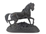 bronze statue of a horse on a rock on a white background