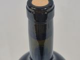 a close up of a bottle of wine on a table